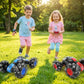 “Kids playing racing RC car toy with remote controller in the ground